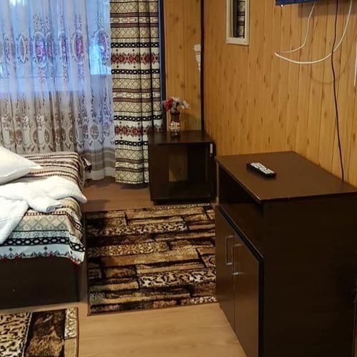 Camera tripla la mansardă cu baie