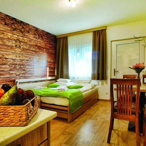 Apartament 4-osobowy z aneksem kuchennym z widokiem na ogród z 2 pomieszczeniami sypialnianymi