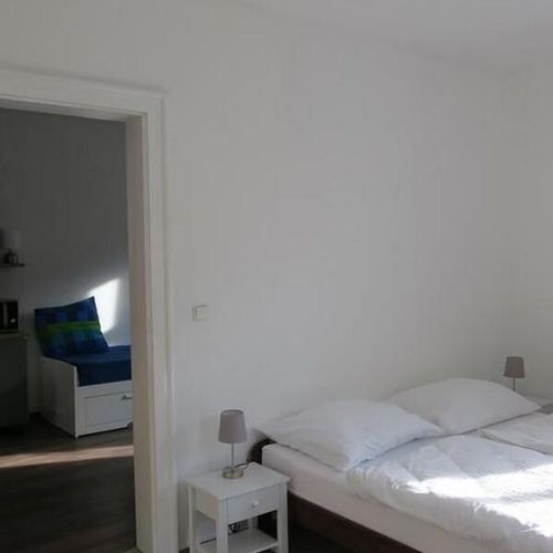 Apartman se sprchou s privátní koupelnou mimo apartmán pro 4 os. se 2 ložnicemi (s možností přistýlky)