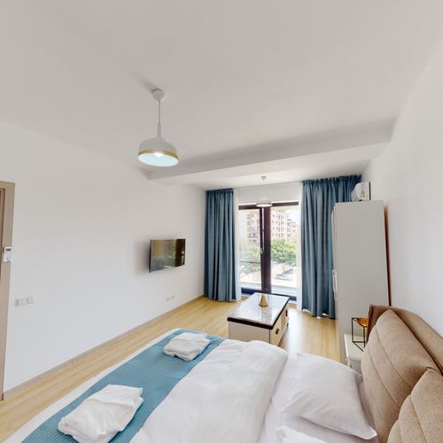 Suita junior cu balcon cu 1 camera pentru 2 pers.