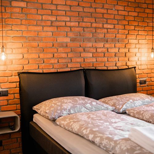 Deluxe  Pokoj s manželskou postelí (s možností přistýlky)