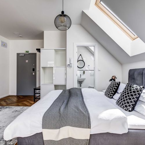 Apartament 2-osobowy z łazienką z aneksem kuchennym z 1 pomieszczeniem sypialnianym