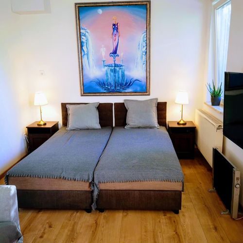 Studio Apartman pro 4 os. s 1 ložnicí s výhledem do zahrady