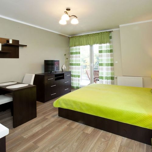 Rodinný Apartman s manželskou postelí s 1 ložnicí (s možností přistýlky)
