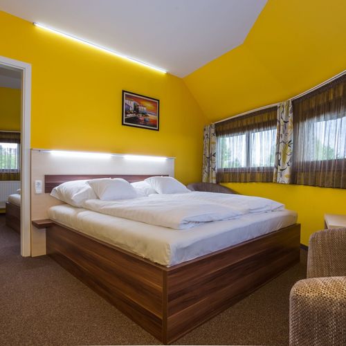 Apartament standard Plus la mansardă cu 2 camere pentru 4 pers.