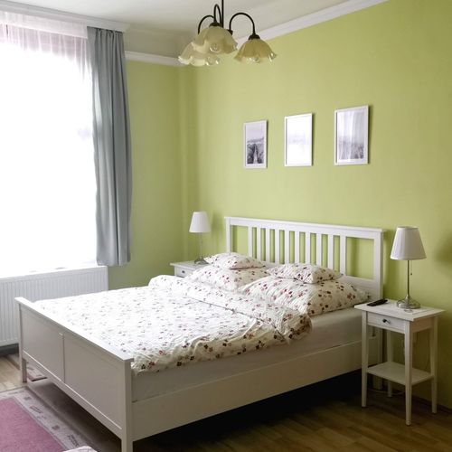 Apartament 11-osobowy cały dom z dostępem do ogrodu z 4 pomieszczeniami sypialnianymi