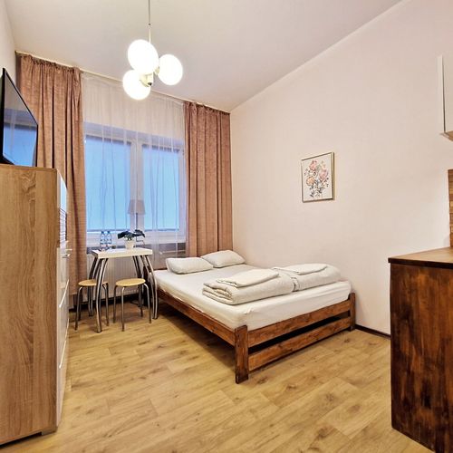 Apartman s koupelnou s vlastní kuchyňkou s manželskou postelí s 1 ložnicí