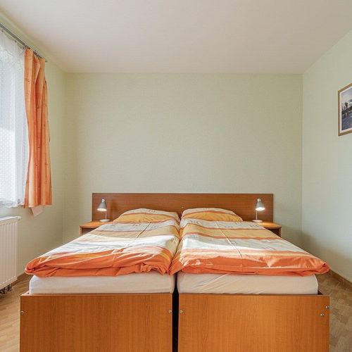 Apartman se sprchou s vlastní kuchyňkou s manželskou postelí s 1 ložnicí