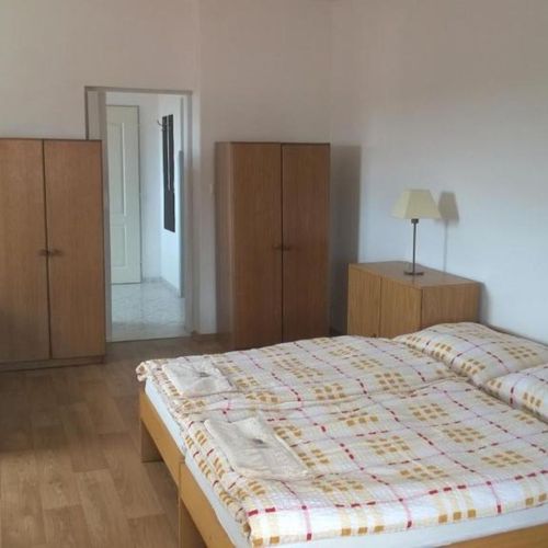 Apartament 7-osobowy z widokiem na ogród z 2 pomieszczeniami sypialnianymi (możliwa dostawka)