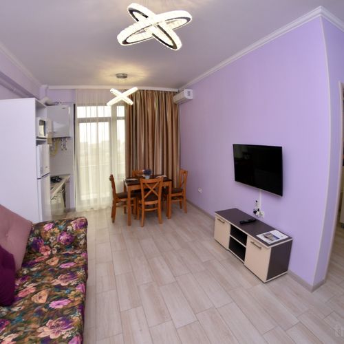 Apartament 4-osobowy Lux z balkonem z 1 pomieszczeniem sypialnianym
