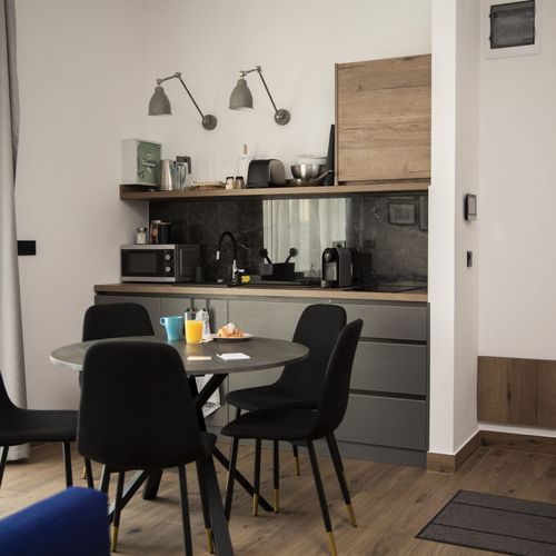 Apartament 5-osobowy na parterze z widokiem na ogród z 3 pomieszczeniami sypialnianymi