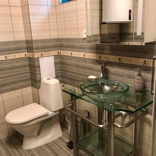 Apartman se sprchou s privátní koupelnou mimo apartmán pro 4 os. se 2 ložnicemi (s možností přistýlky)