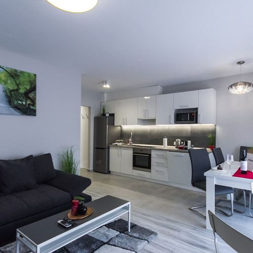 Apartament 6-osobowy na parterze z widokiem na ogród z 3 pomieszczeniami sypialnianymi