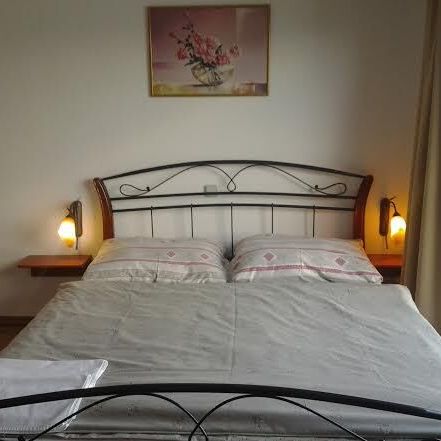 Apartament 4-osobowy z tarasem z 2 pomieszczeniami sypialnianymi (możliwa dostawka)