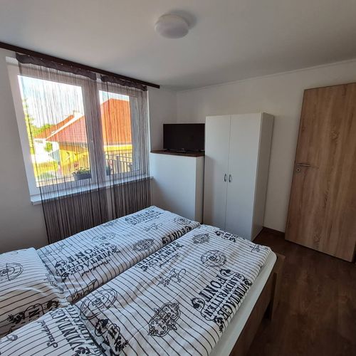 Apartament 4-osobowy z 2 pomieszczeniami sypialnianymi (możliwa dostawka)