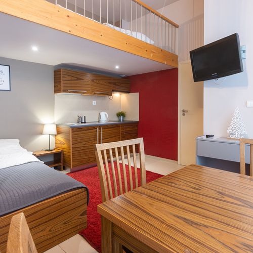 Apartament 4-osobowy z łazienką z aneksem kuchennym z 1 pomieszczeniem sypialnianym