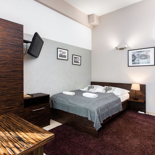 Apartament 2-osobowy z łazienką z aneksem kuchennym z 1 pomieszczeniem sypialnianym