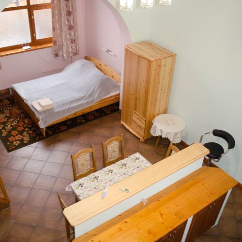 Rodinný Apartman pro 4 os. s 1 ložnicí s výhledem do zahrady
