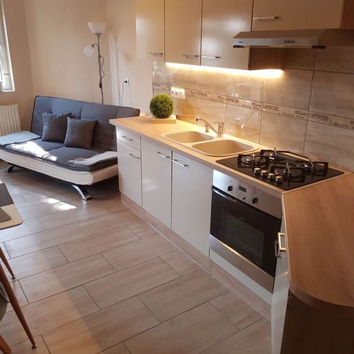 Apartament 4-osobowy na parterze z tarasem z 2 pomieszczeniami sypialnianymi