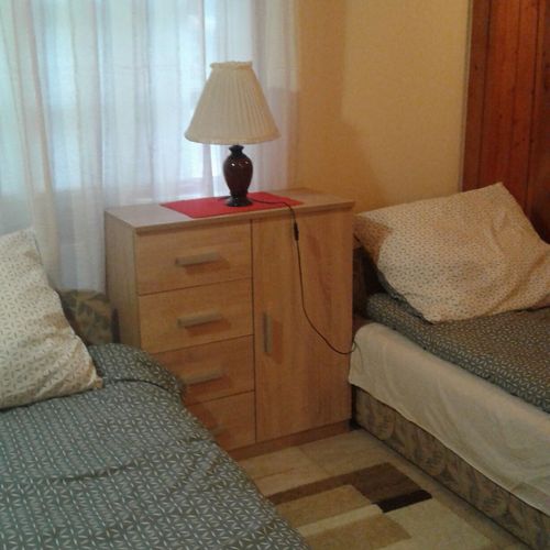 Camera single la parter cu vedere spre oraș