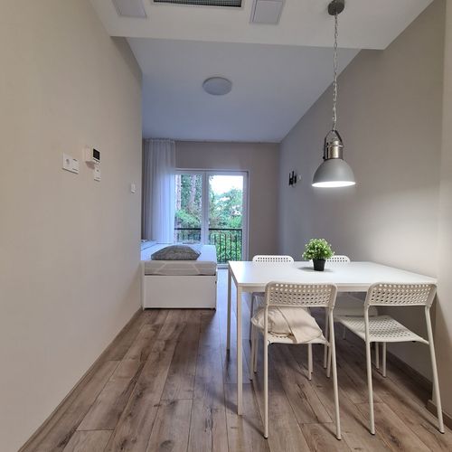 Apartament la etaj cu vedere spre grădină cu 2 camere pentru 4 pers.