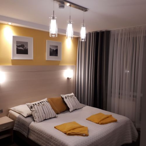 Apartament 4-osobowy z 2 pomieszczeniami sypialnianymi (możliwa dostawka)