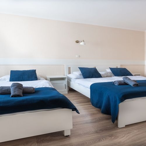 Camera tripla familial(ă) într-o clădire separată de Spa
