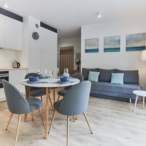 Apartament 4-osobowy na piętrze z balkonem z 2 pomieszczeniami sypialnianymi