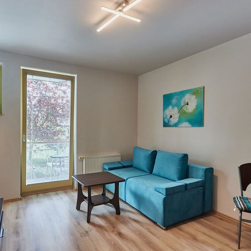 Apartament 2-osobowy na parterze z balkonem z 1 pomieszczeniem sypialnianym