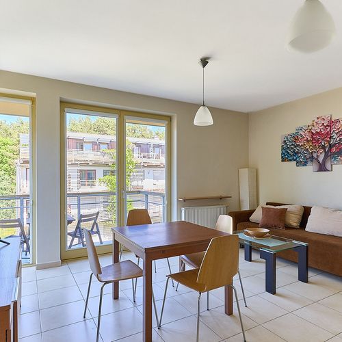 Apartament 4-osobowy na piętrze z balkonem z 2 pomieszczeniami sypialnianymi