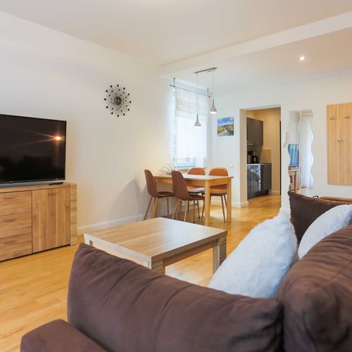 Apartament 4-osobowy na parterze z tarasem z 2 pomieszczeniami sypialnianymi