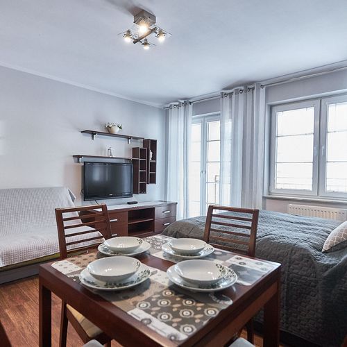 Apartament 4-osobowy na piętrze z balkonem z 1 pomieszczeniem sypialnianym