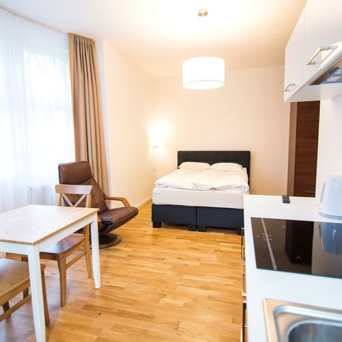 Apartament 2-osobowy na parterze z 1 pomieszczeniem sypialnianym
