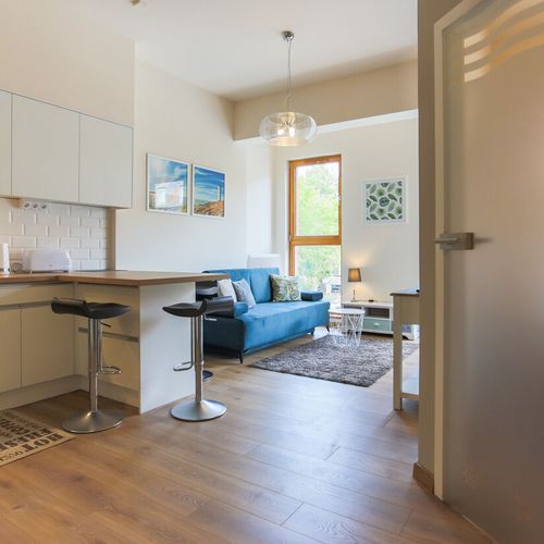 Apartament 4-osobowy na piętrze z balkonem z 2 pomieszczeniami sypialnianymi