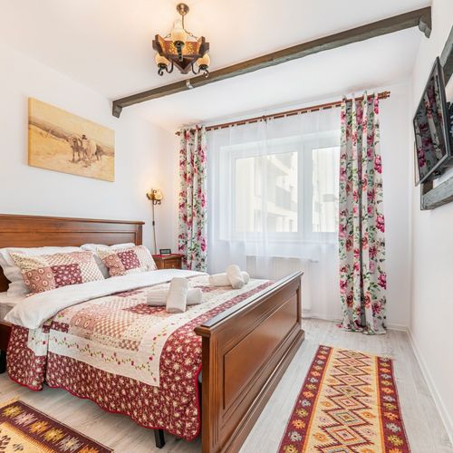 Apartament la etaj cu vedere spre grădină cu 2 camere pentru 4 pers.
