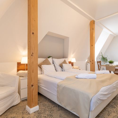 Apartament 3-osobowy na poddaszu na poddaszu z 2 pomieszczeniami sypialnianymi