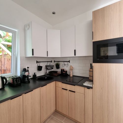 Apartament lCD TV cu vedere spre grădină cu 2 camere pentru 4 pers.