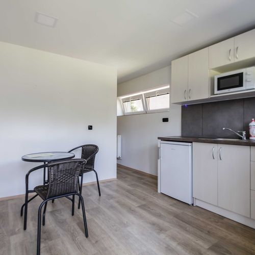 Studio Apartman pro 4 os. s 1 ložnicí s výhledem do zahrady