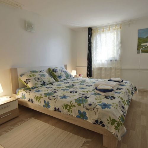 Apartament 4-osobowy na parterze z tarasem z 2 pomieszczeniami sypialnianymi