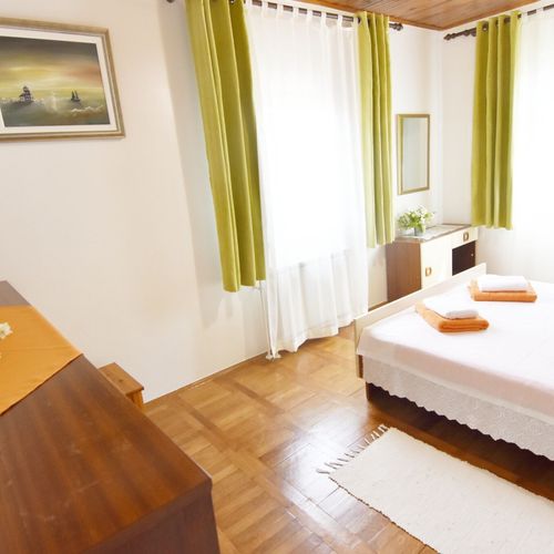 Apartament 4-osobowy na piętrze z balkonem z 2 pomieszczeniami sypialnianymi
