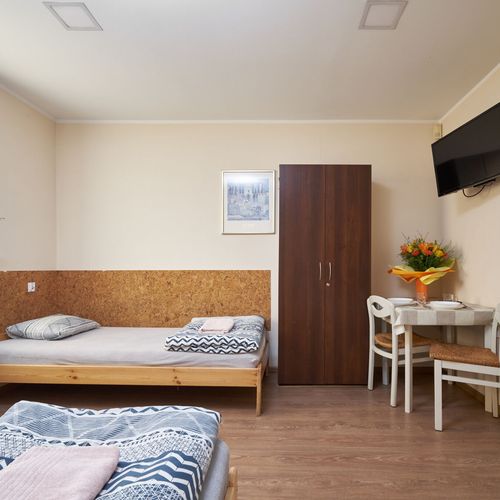 Apartament 2-osobowy z łazienką z aneksem kuchennym z 1 pomieszczeniem sypialnianym