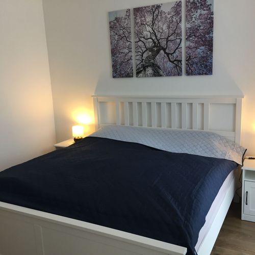 Apartament la parter cu vedere spre grădină cu 2 camere pentru 4 pers.