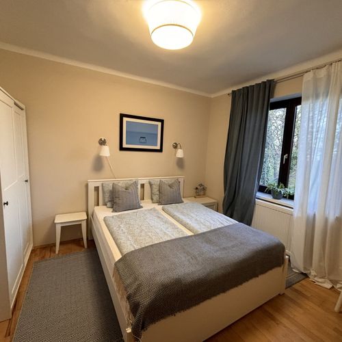 Pokoj s manželskou postelí s panoramou přízemní