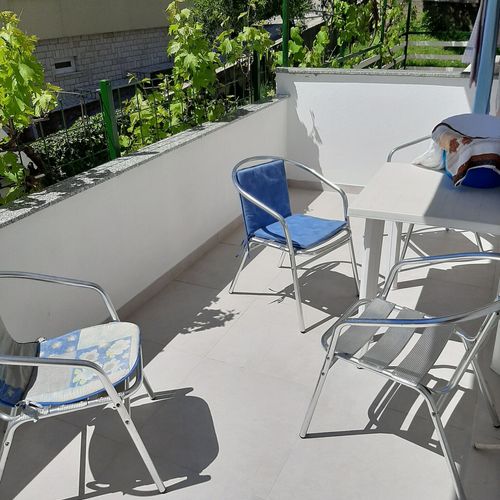 Apartament 2-osobowy z klimatyzacją z tarasem z 1 pomieszczeniem sypialnianym (możliwa dostawka)