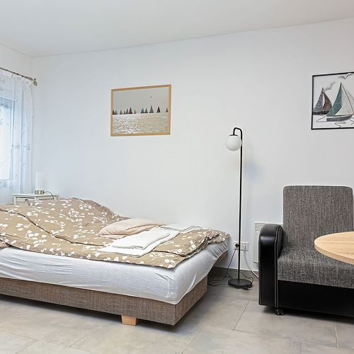 Apartman pro 2 os. s 1 ložnicí s výhledem do dvora přízemní