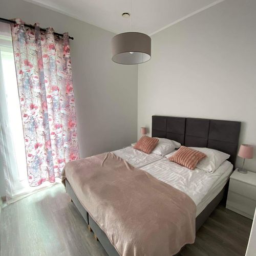 Apartament 4-osobowy z balkonem z widokiem na jezioro z 2 pomieszczeniami sypialnianymi