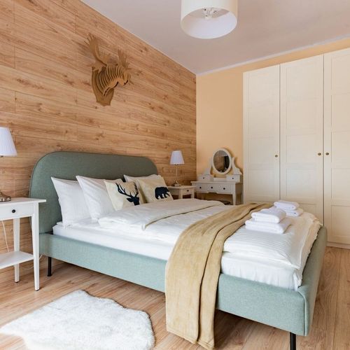 Apartament 4-osobowy w suterenie z widokiem na ogród z 2 pomieszczeniami sypialnianymi