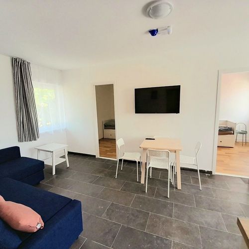 Apartament 4-osobowy na piętrze z panoramą z 2 pomieszczeniami sypialnianymi (możliwa dostawka)