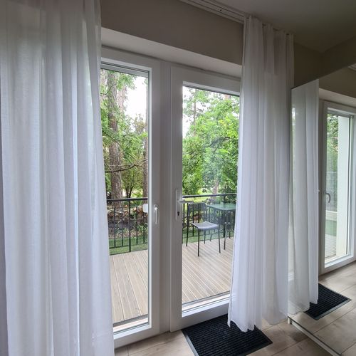 Apartament la parter cu vedere spre grădină cu 1 camera pentru 2 pers.