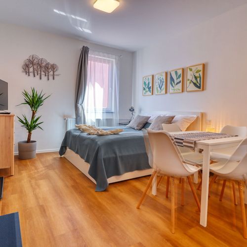 Apartament 4-osobowy na piętrze z klimatyzacją z 2 pomieszczeniami sypialnianymi